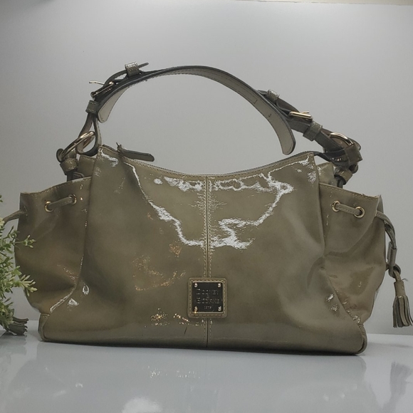 Dooney & Bourke Handbags - Dooney&bourke payent leather with tassels
